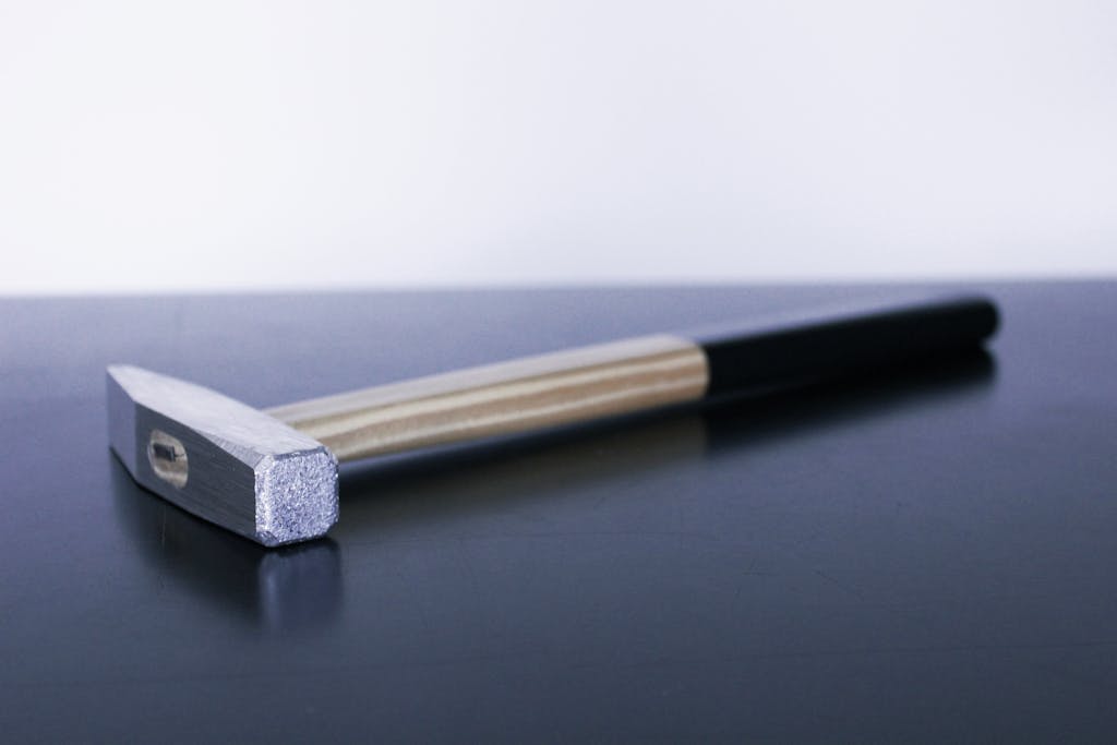 <p style="font-size:10px">Stéphanie Saadé, Sensitive Hammer, 2014, Aluminum, wood, paint, 27 x 9 cm, 5 x 2 cm</p>

<p style="font-size:10px">A hammer is made out of a sensitive metal, keeping the trace of every shock that it gives.</p> - © Image courtesy of the artist and Grey Noise, Dubai, Paris Internationale