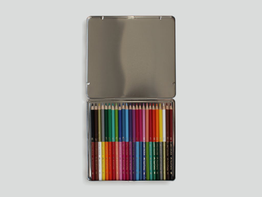 Stéphanie Saadé, Cut Color, 2014, cut and glued Faber Castell pencils, aluminium box, 19.6 x18.5x1 cm, variation 2/3
/
Colored pencils are cut in the middle. Reversing the way they were ordered in the box, they are assembled
again. - © Image courtesy of the artist and Grey Noise, Dubai, Paris Internationale