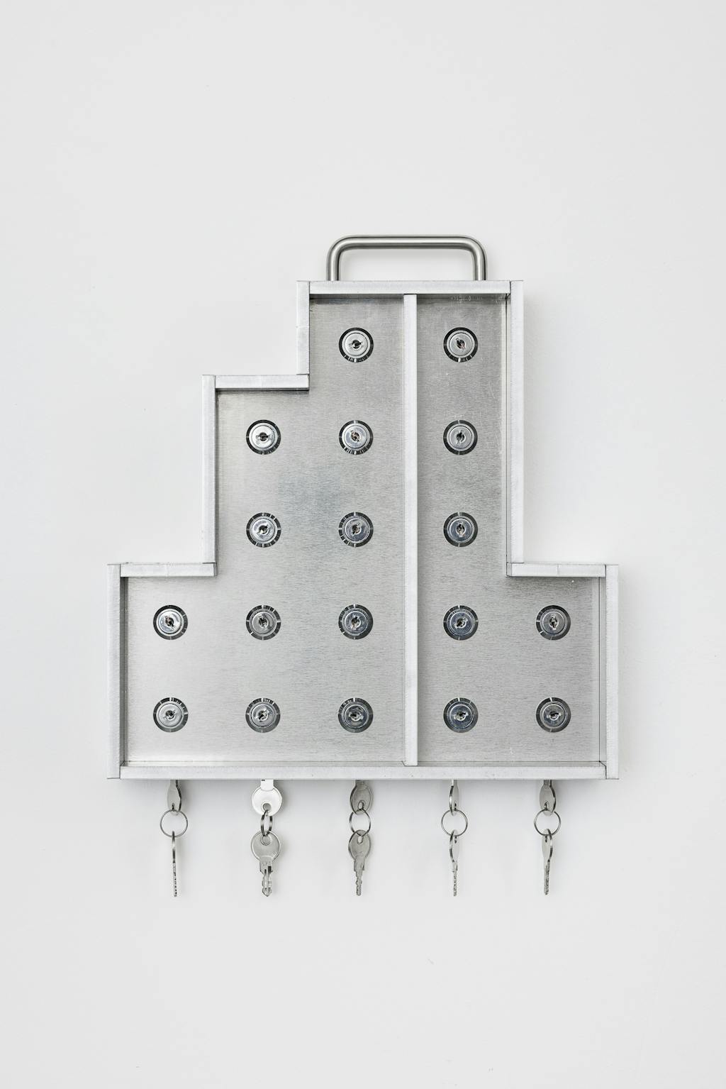 Irina Lotarevich, *Housing Anxiety 4*, 2022, aluminium, stainless steel, locks and keys, 39 x 37 x 7 cm - © Paris Internationale